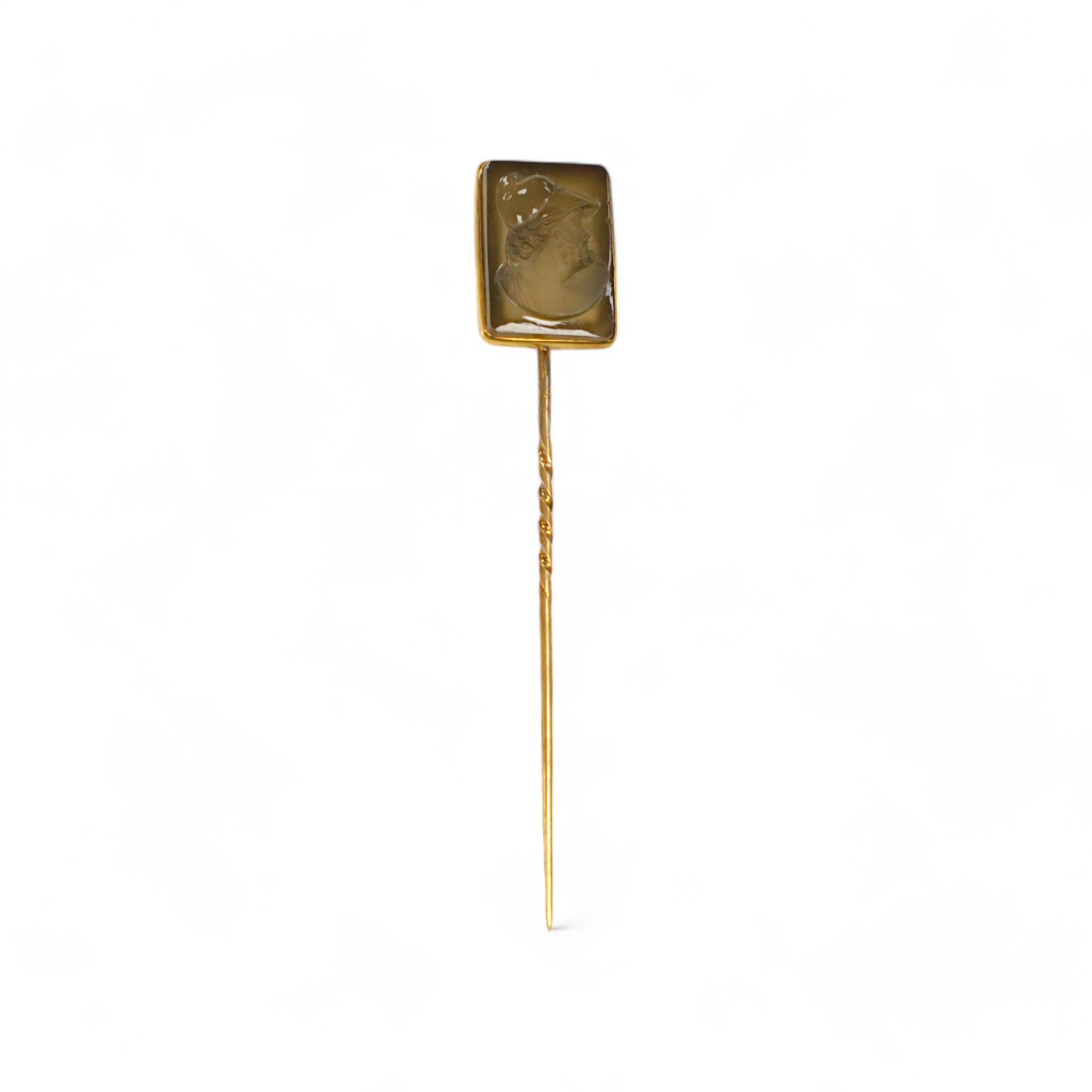 A yellow metal and cameo hardstone set stick pin, 88mm, gross weight 6.9 grams. Condition - poor to fair